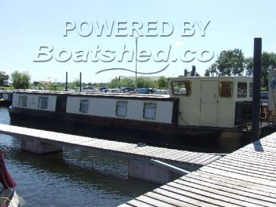 Wide Beam Houseboat