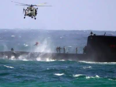 Three killed in navy disaster as crew swept off submarine deck