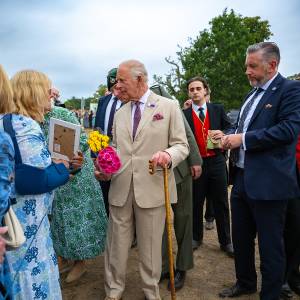 Their Majesties meet designer of RNLI lifeguard garden at RHS Sandringham Flower Show
