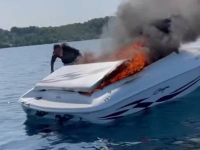 Video: Two people saved after leaping from burning boat in Michigan