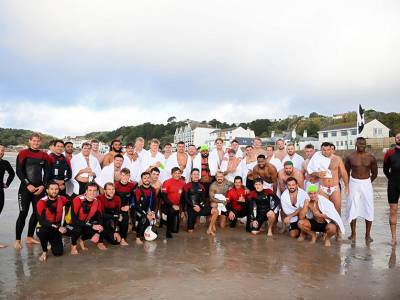 RNLI lifeguards keep England rugby team safe during aquatic training