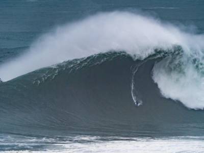 VIDEO: Surfers take on biggest waves in the world