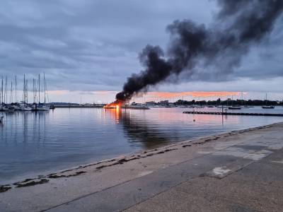 Catamaran ablaze in Poole
