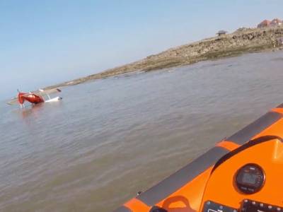 RNLI crews assist as light aircraft ditches into sea